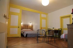 Appartement L'Aristoloche : photos des chambres