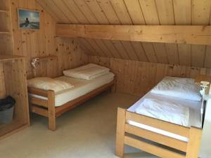 Hebergement la maison des inuits : Chambre Familiale avec Salle de Bains Commune