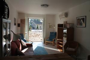 Hebergement Maison Sous les Platanes : photos des chambres