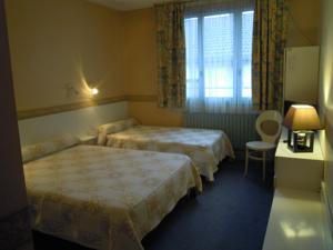 HOTEL DE LA POMME D'OR : photos des chambres
