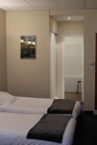 Hotel de La Promenade : Chambre Quadruple avec 1 Lit Double et 2 Lits Simples
