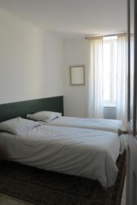 Appartement Petite Bourgade : photos des chambres