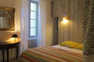 Appartement Petite Bourgade : photos des chambres