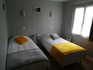 Hotel O PTi' NID : Chambre Lits Jumeaux avec Toilettes Communes