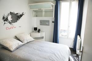 Appartement A 5 minutes de Paris : photos des chambres