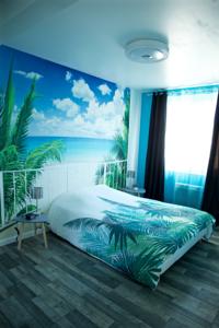 Appartement Le Paradis Manceau : photos des chambres