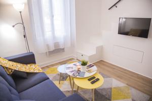 Appartement Studio cosy avec mezzanine a 6 mins de Paris : photos des chambres