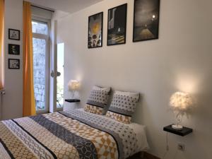 Appartement Sympathique logement en centre ville : photos des chambres