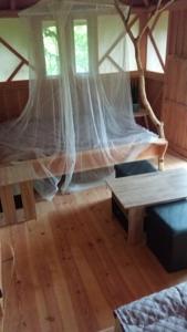 Chambres d'hotes/B&B Cabane Dans Les Arbres : photos des chambres