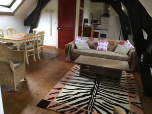 Appartement Le Moulin de Ladouch : photos des chambres