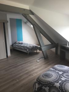 Appartement Au Pied De La Roche : photos des chambres