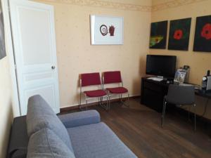 Appartement Cosy a Soissons, 38mn de Roissy de CDG : photos des chambres