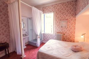 Hebergement La Roseraie : photos des chambres