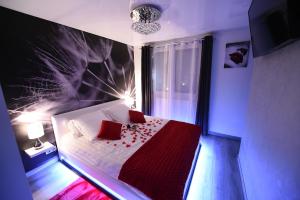 Appartement GLAM'APPART SPA : photos des chambres