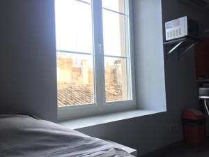 Appartement Studio renove dans le centre ville : photos des chambres
