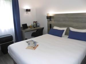 Quality Hotel Le Circuit : photos des chambres