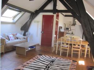Appartement Le Moulin de Ladouch : photos des chambres