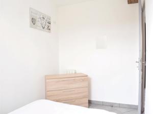 Appartement One-Bedroom Apartment in Sainteny : photos des chambres