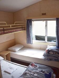 Hebergement Village de Chalets de Rocamadour : photos des chambres