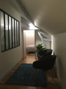 Appartement Au Tilleul : photos des chambres
