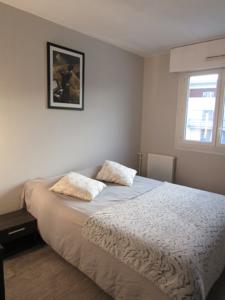 Appartement 70m² au centre de Reims : photos des chambres