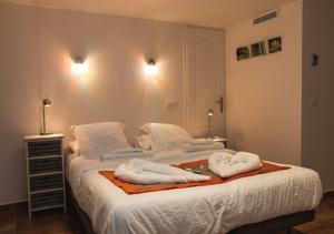 Appartement Harmonice & Spa : photos des chambres