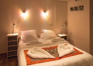 Appartement Harmonice & Spa : photos des chambres