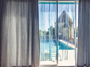 Hebergement Manoir avec piscine privee : photos des chambres