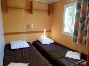 Hebergement Camping Audinac Les Bains : photos des chambres