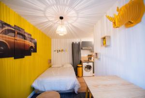 Appartement Le studio Yellow : photos des chambres