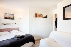 Appartement Beau Studio : photos des chambres