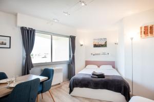 Appartement Beau Studio : photos des chambres