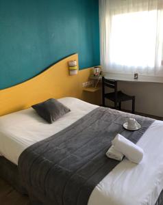Couett'Hotel Saint Jean d'Angely : photos des chambres