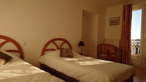 Hotel Du Rocher : photos des chambres
