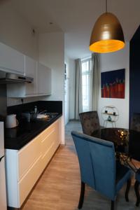 Appartement La Citadine, 3 Appartments : photos des chambres