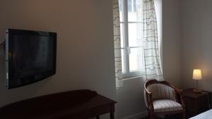 Hotel Au Pigeon Blanc : photos des chambres