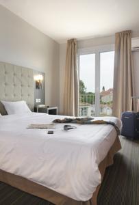 Hotel The Originals Perpignan Sud Le Grillon d'Or (ex Inter-Hotel) : photos des chambres