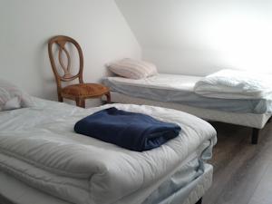 Appartement - Au Vieux Moulin : photos des chambres