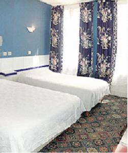 Hotel Jarry Confort : Chambre Quadruple avec Baignoire