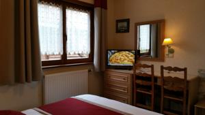 Hotel La Sapiniere : photos des chambres
