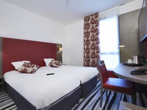 Hotel Kyriad Plaisir St Quentin en Yvelines : photos des chambres