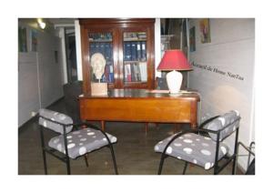 Appartement Home Nantua studio meubles Ain-Jura : photos des chambres