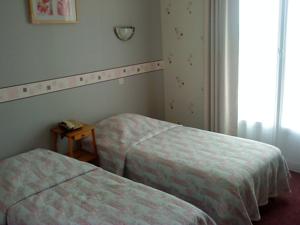 Hotel Le Lyon Vert : photos des chambres