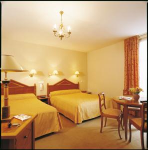 Hotel The Originals Paray-le-Monial Hostellerie des Trois Pigeons (ex Inter-Hotel) : photos des chambres