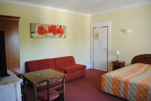 Hotel Hostellerie Le Griffon : photos des chambres