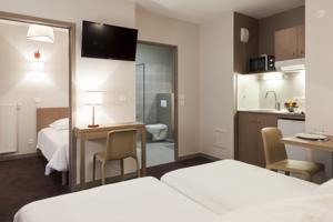 Hebergement Comfort Suites Porte de Geneve : Suite Triple 