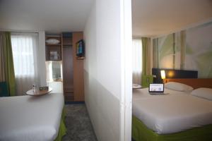 Hotel ibis Styles Orleans : Suite Familiale Standard avec 2 Chambres Communicantes - Petit-Déjeuner Inclus