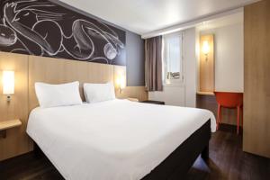 Hotel ibis Saint-Denis Stade Ouest : photos des chambres
