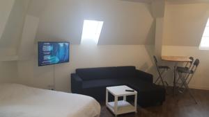 Hotel Au Pigeon Blanc : photos des chambres