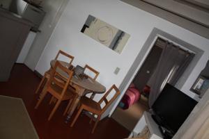Appartement La petite maison : photos des chambres